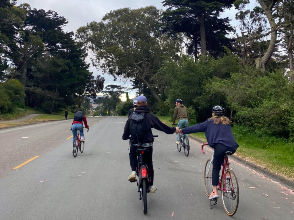 Group of friends biking around Golden Gate Park