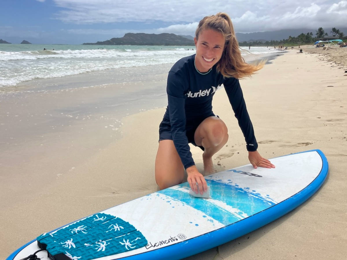 The author Rebecca Parsons wearing a Billabong Standard All Day Boardshort at the Beach