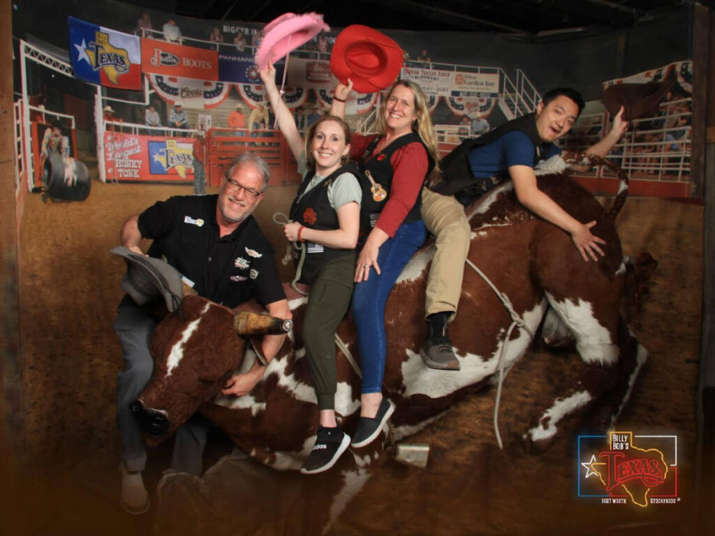 The author, Sarah Heath with her husband and friends at the Billy Bob’s - Fort Worth