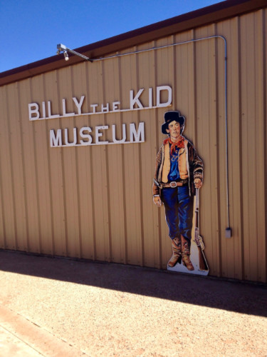 The Billy the Kid Museum sign featuring the outlaw himself