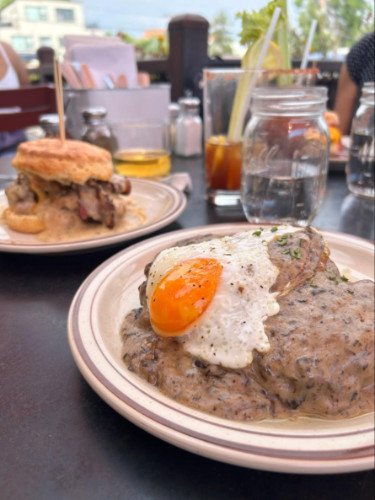 Plates of Biscuits with mushroom gravy served at Denver Biscuit Co