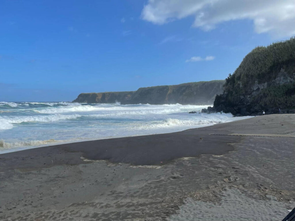 Panoramic view of the black sandy beach in São Miguel