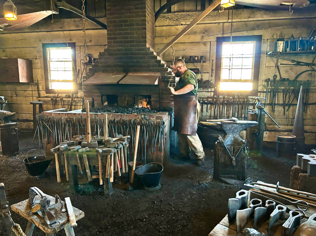 A blacksmith demonstrating in Fort Vancouver