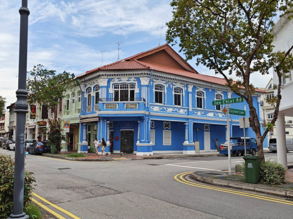 A vibrant blue heritage building along the Joo Chiat Road