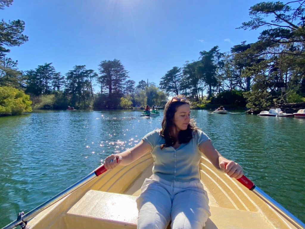 The author's partner paddling their boat on Blue Heron Lake