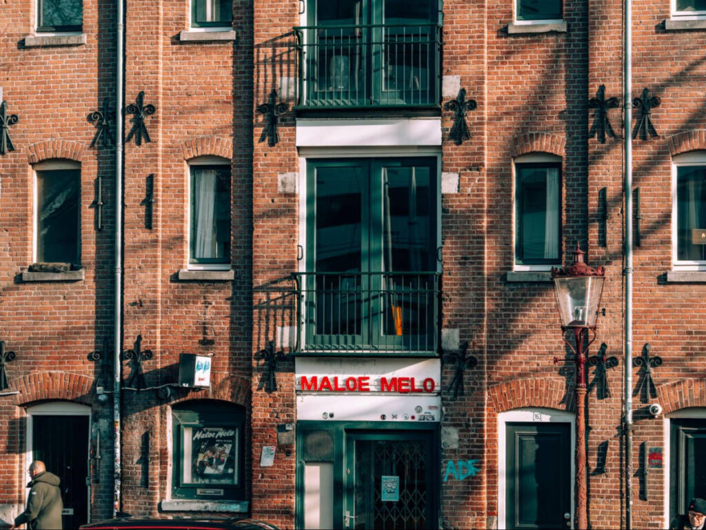 View of the brick walled exterior of Bluescafé Maloe Melo