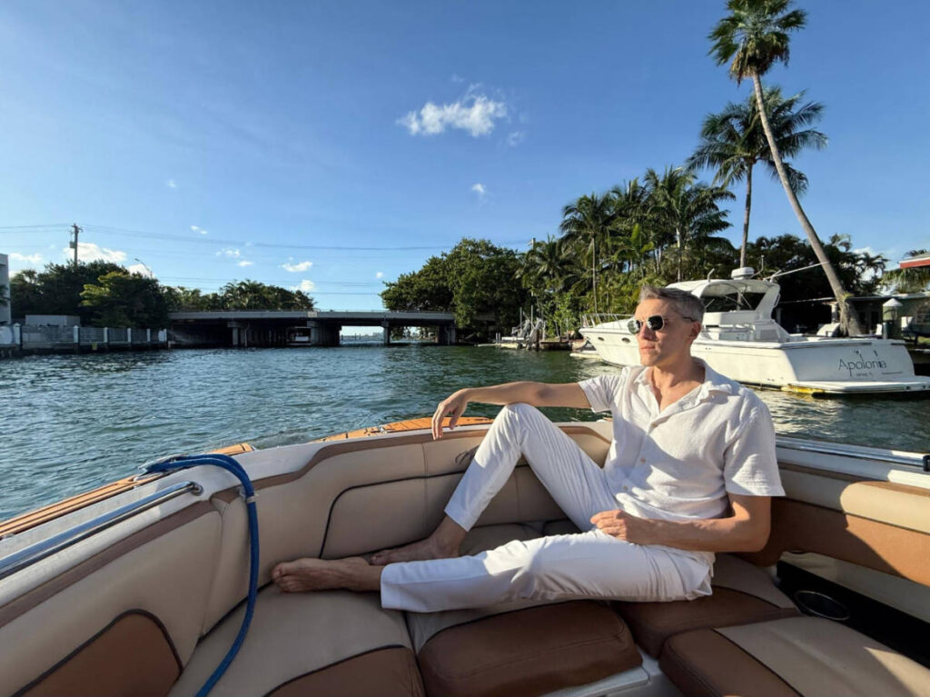 Travel Lemming founder, Nate Hake, enjoying his day on a boat in Miami