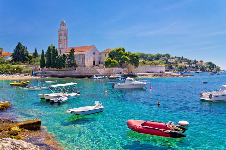 View of the boats around Hvar Island against a clear blue sky
