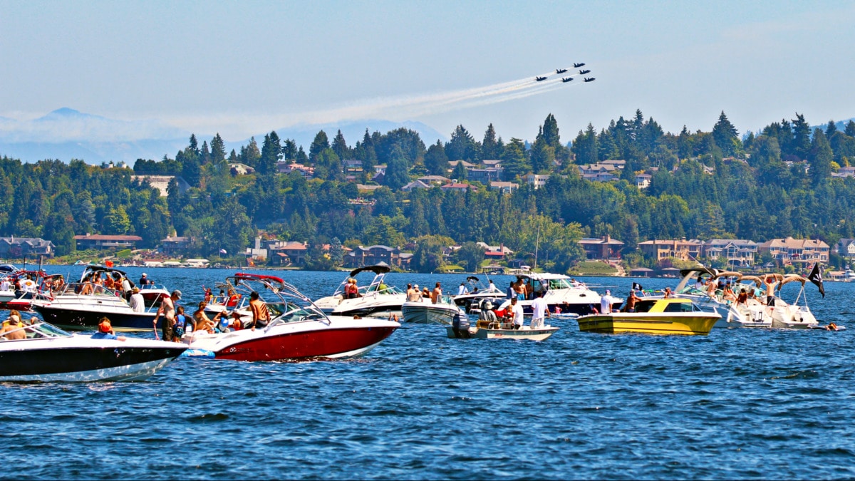 View of the people celebrating on the boats in Lake Washington During Seafair