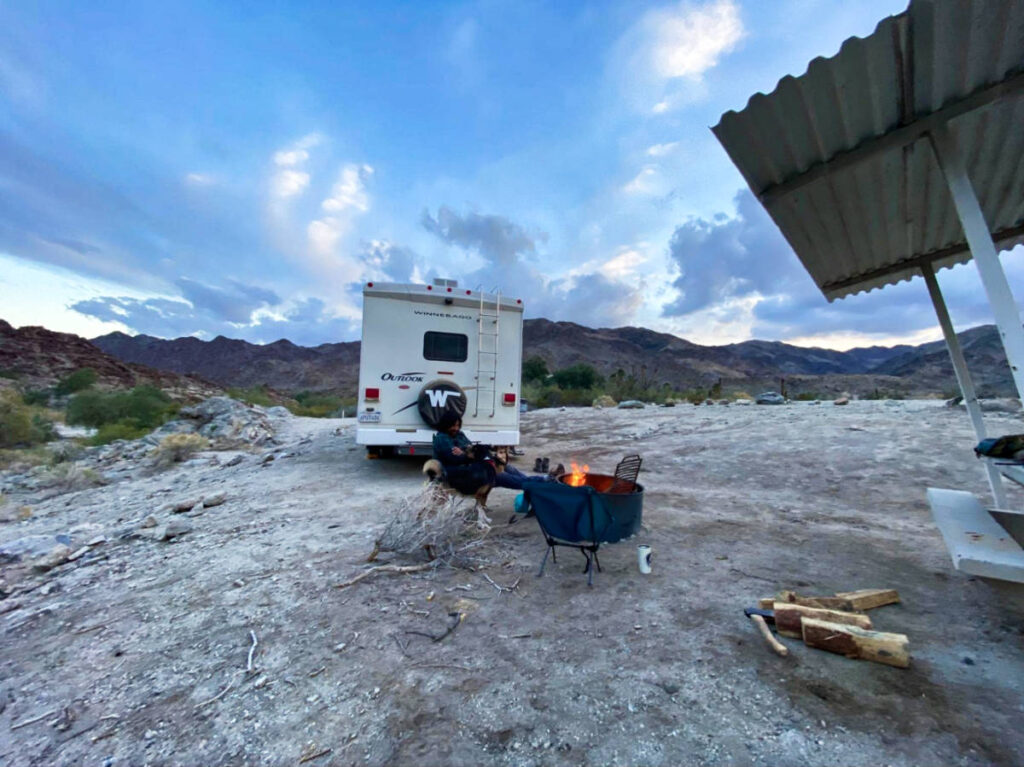 The author McKenna Mobley, having a bonfire at the campground near Death Valley