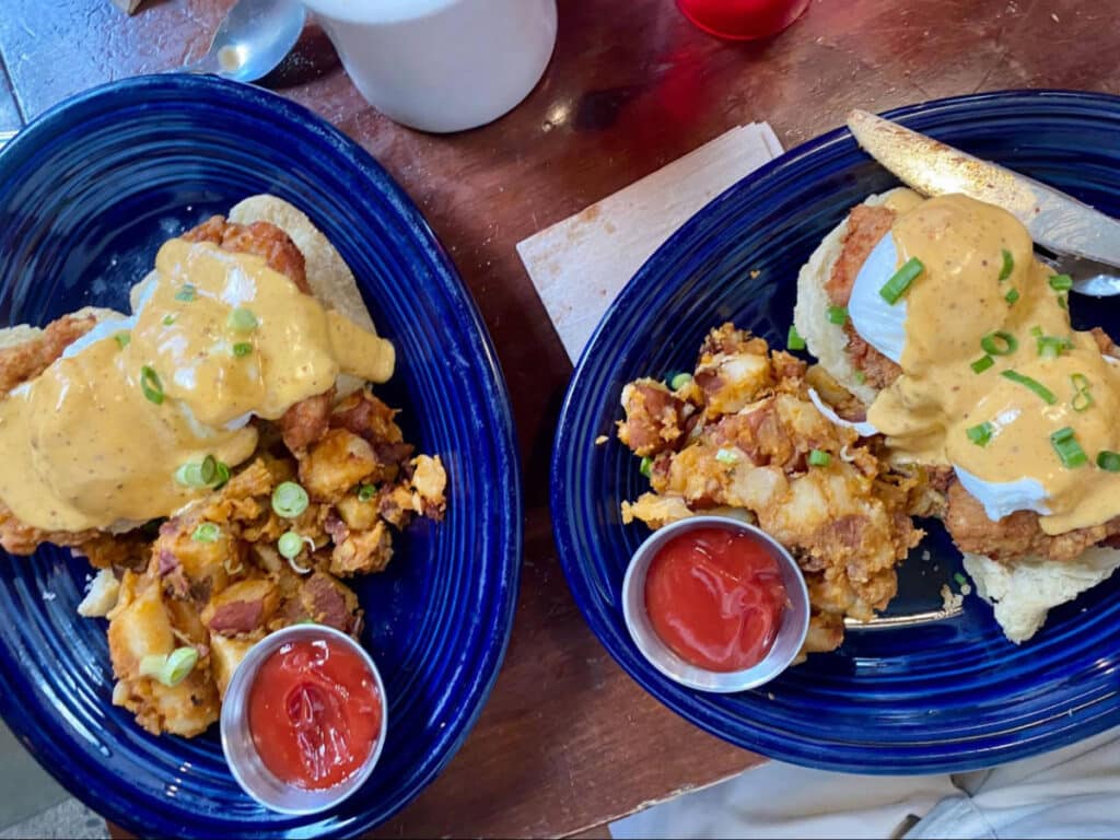 A fried chicken eggs benedict served during brunch in Brenda’s Meat & Three