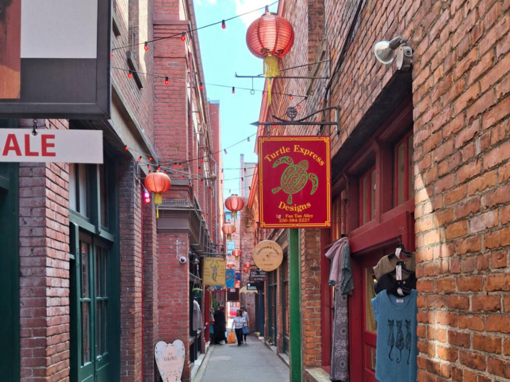View of the brick walled buildings along the Fan Tan Alley