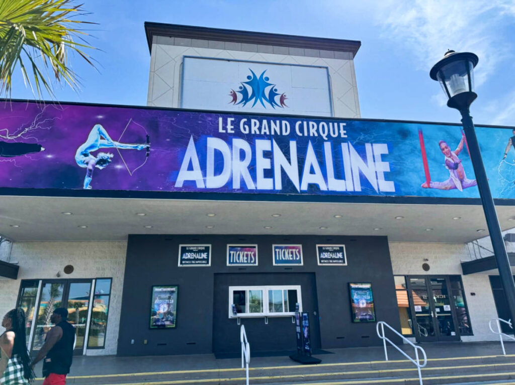 View of the Le Grand Cirque Adrenaline show poster outside the Broadway Theatre