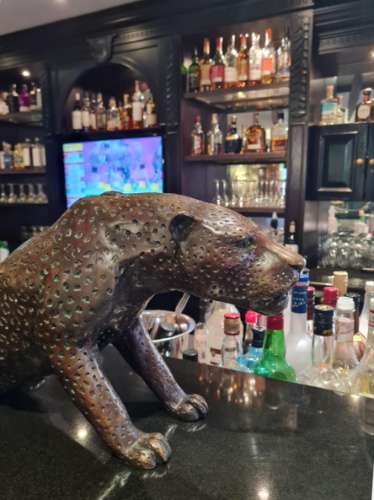 Closeup look of a bronze leopard statue