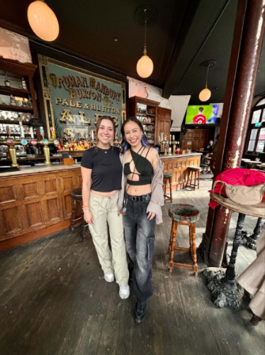 The author Brooke Horrobin and her friend, at a local Shoreditch pub