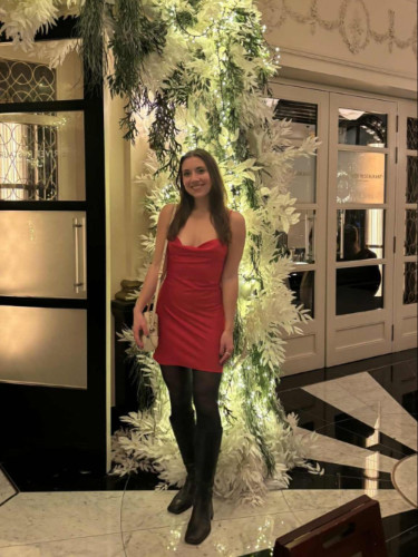 Author Brooke standing at the entrance of Beaufort Bar