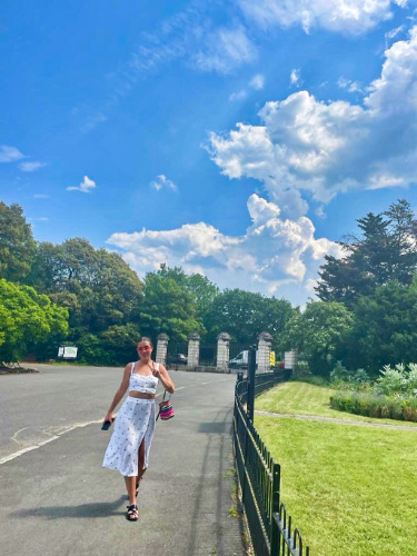 The author Brooke Horrobin, walking around Dulwich Park on a sunny day