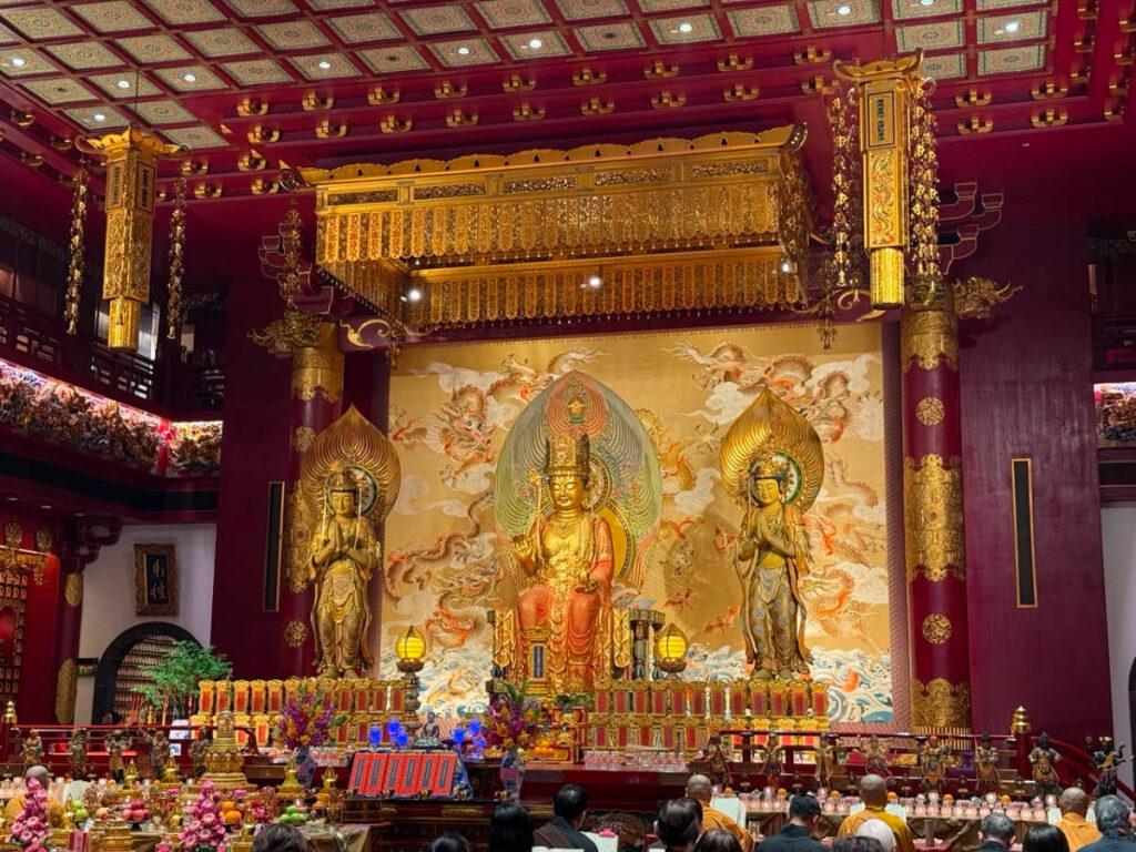 View of the grand and golden main prayer hall at the Buddha Tooth Relic Temple in Chinatown