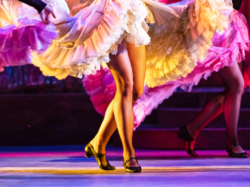 Closeup look of the feet of the burlesque show performers