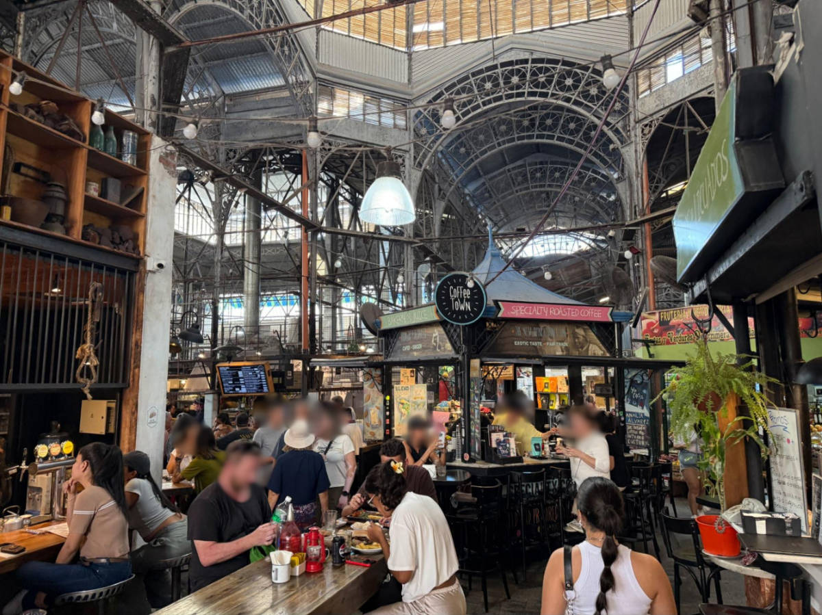 The crowd eating at the bustling San Telmo Market