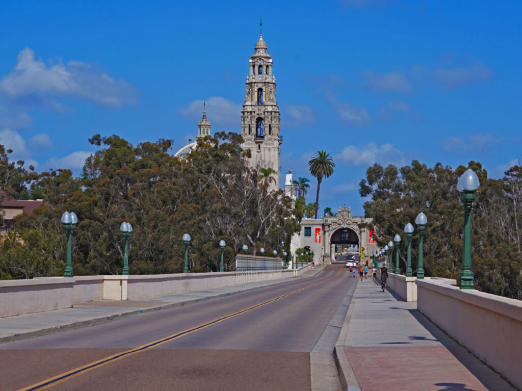 People and cars crossing the Cabrillo Bridge in Balboa Park