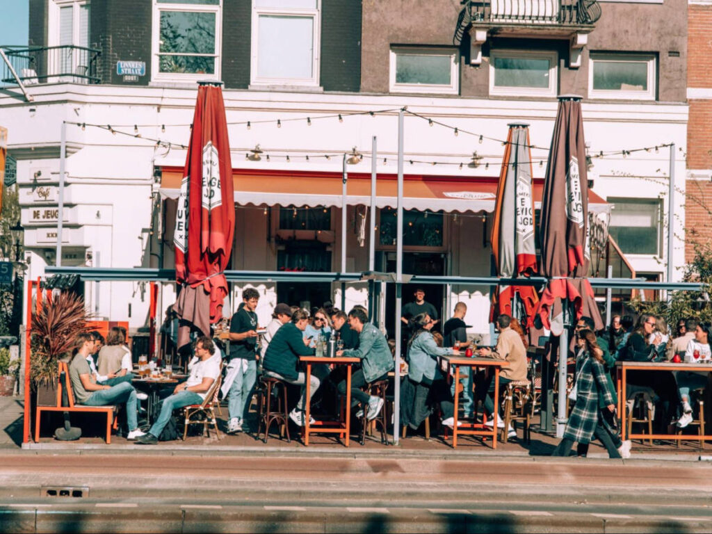 People drinking outside Café de Jeugd