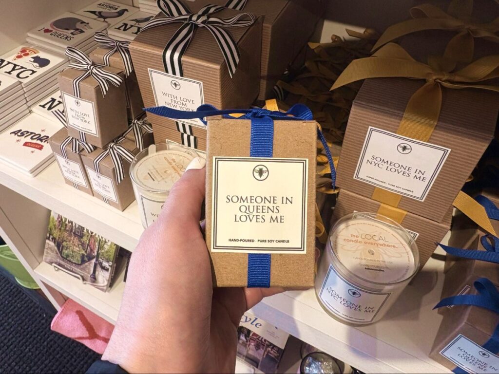 Holding a box of Handmade Candles from Lockwood