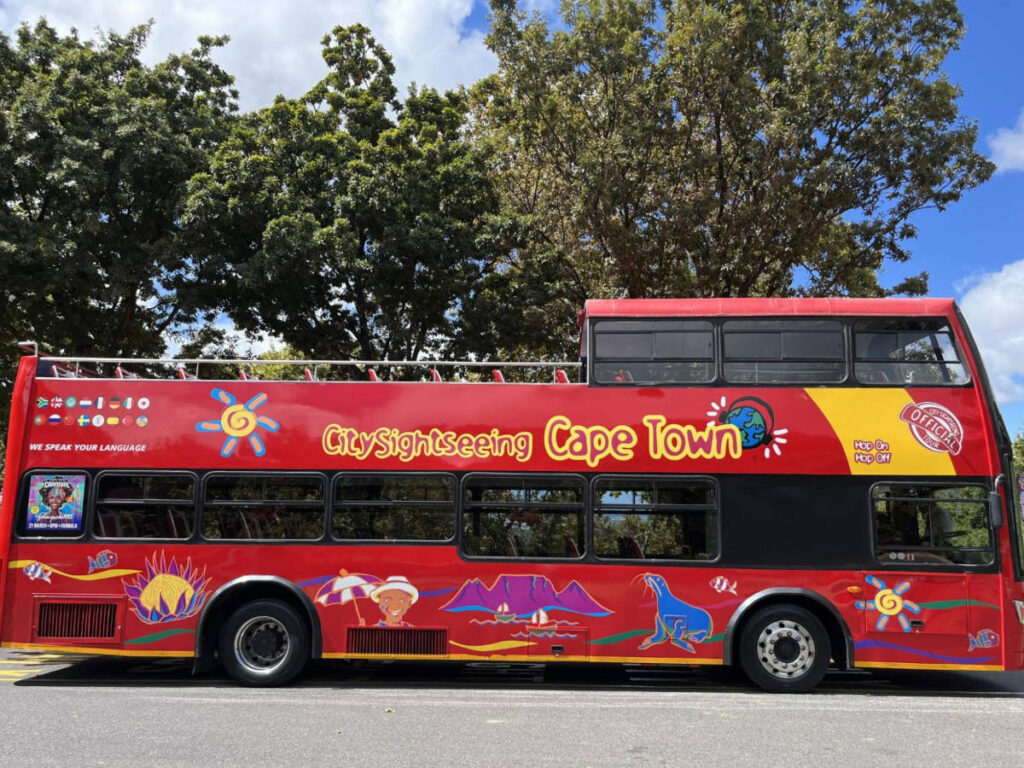 The vibrant red city sightseeing bus