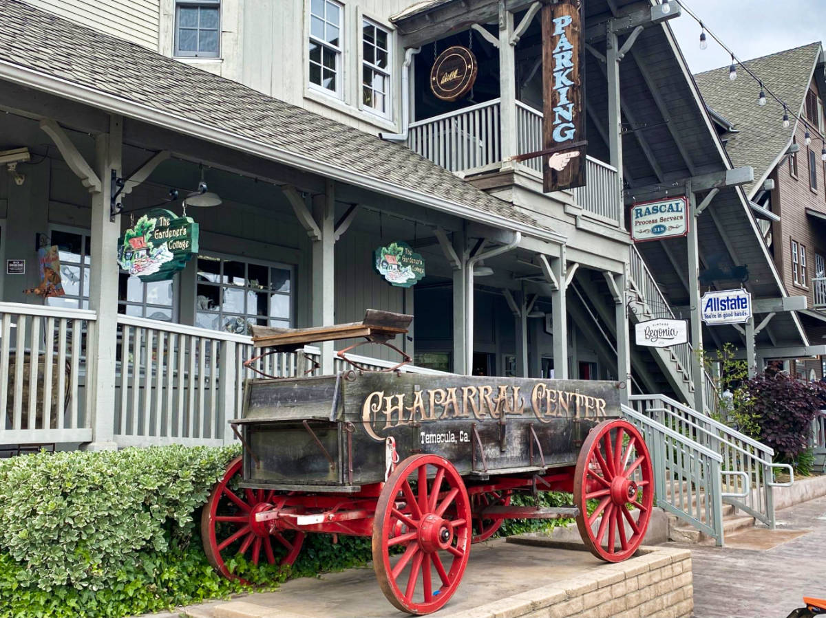 An old carriage displayed outside a shop in Old Town Temecula