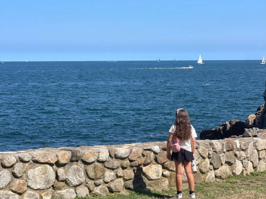 The author's daughter admiring the view at Castle Rock Park in Marblehead
