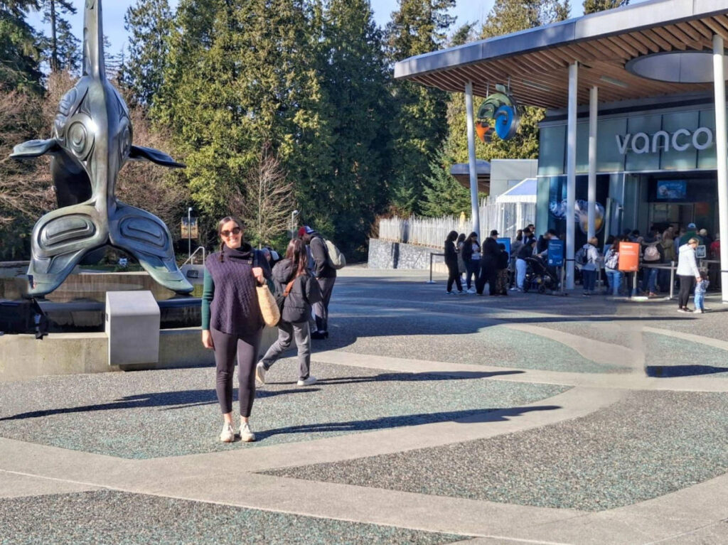 Travel Lemming writer Catherine, posing for a photo outside the Vancouver Aquarium