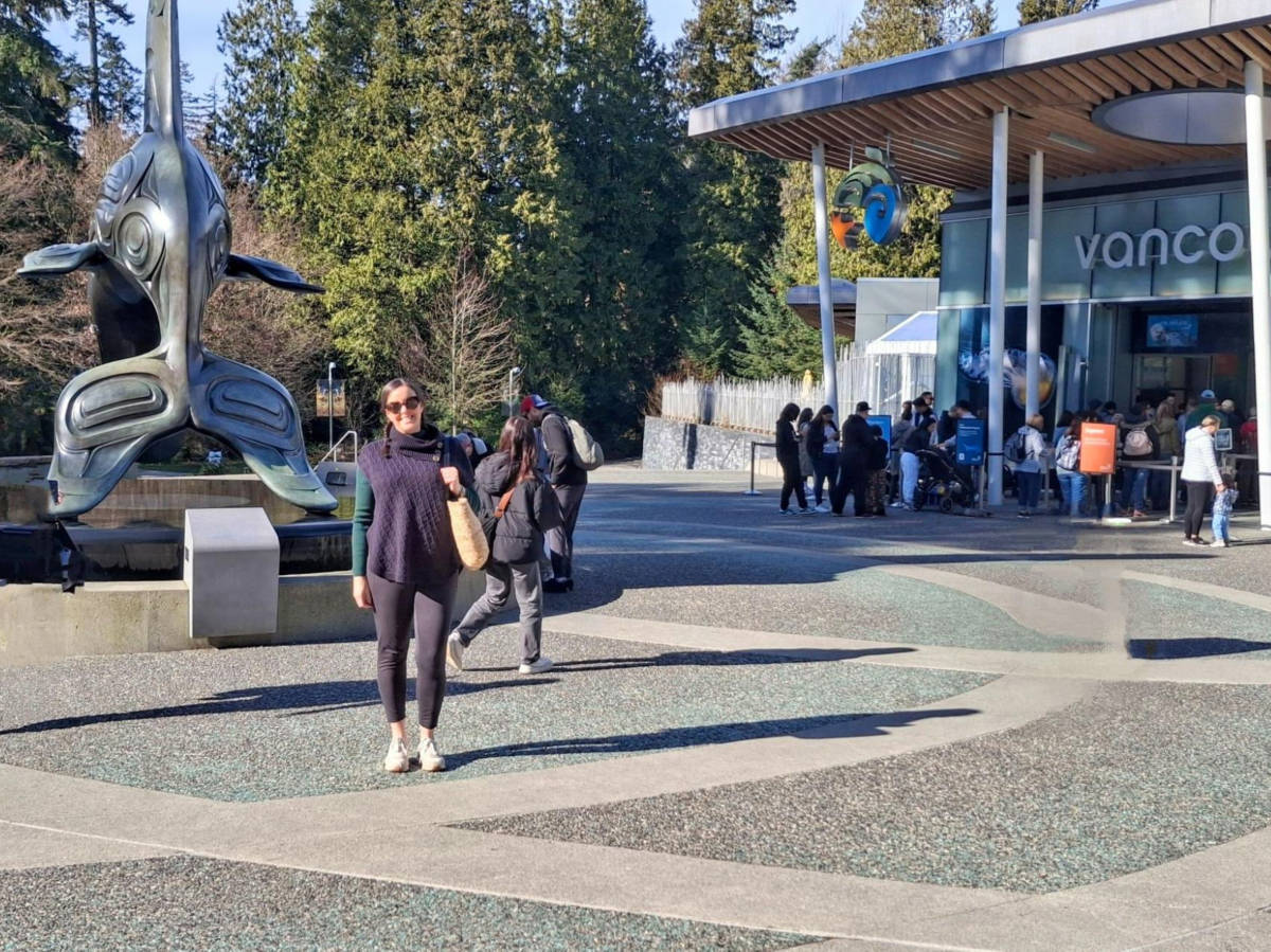 Travel Lemming writer Catherine, posing for a photo outside the Vancouver Aquarium