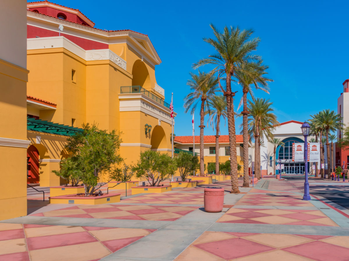 Cathedral City Center filled with colorful and interesting architecture enhanced with palm trees and vegetation