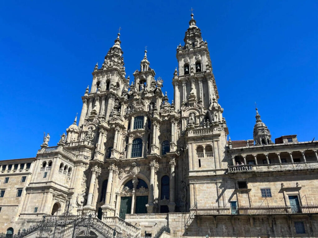 Perspective view of the Cathedral of Santiago de Compostela and the deep blue sky in the background