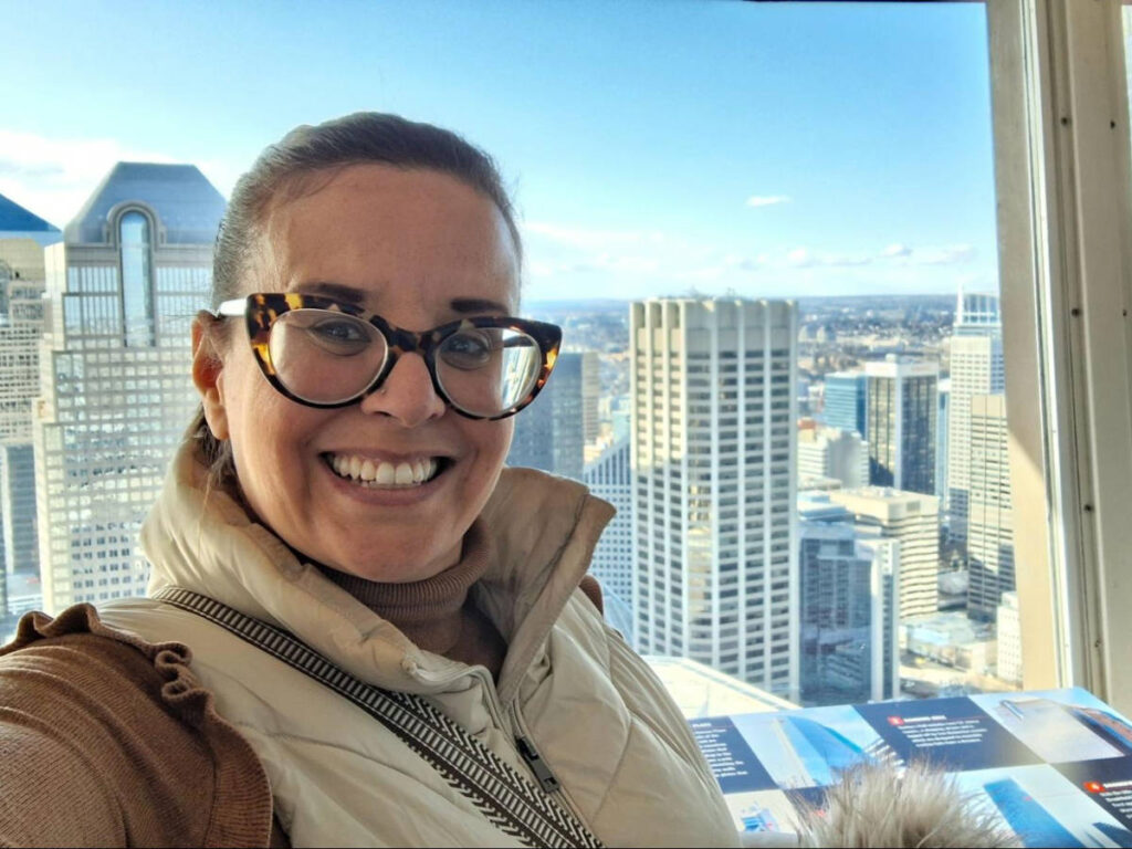 The author Catherine Driver, enjoying the overlooking views at the Calgary Tower