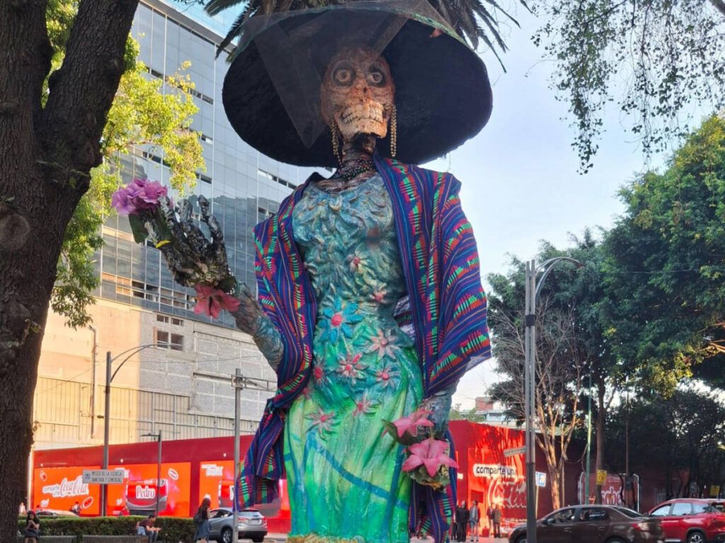 View of the huge and colorful Catrinas on display along the Reforma