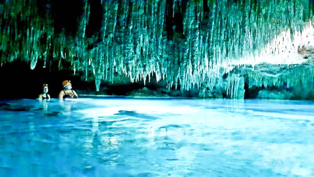 The author Taylor Herperger and her friend on a caving tour in Playa del Carmen