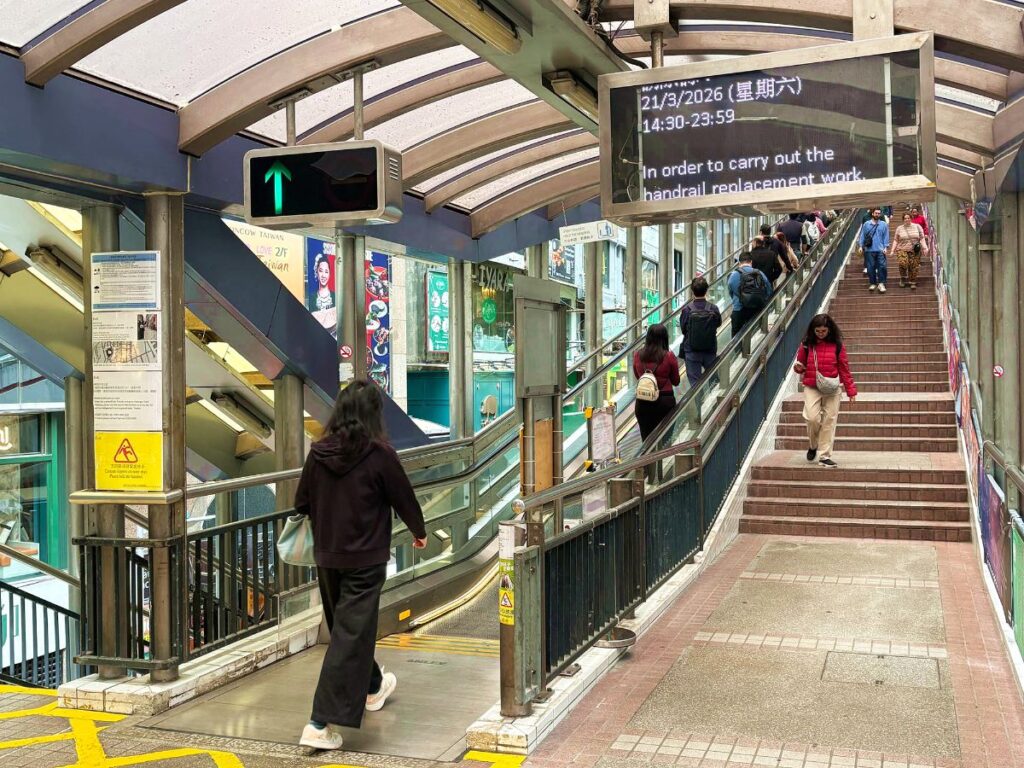 People heading up the Central-Mid Levels Escalator