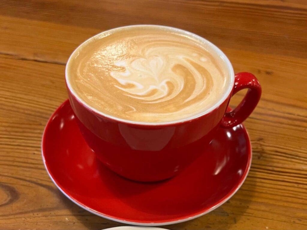 A cup of chai latte at Take Care by OLEO