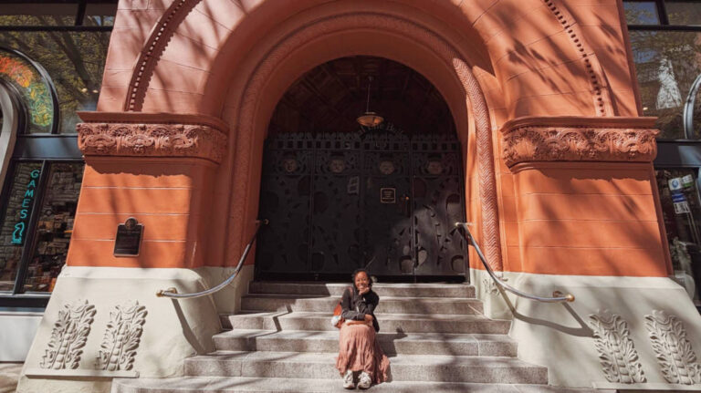 The author, Chelsea Booker in front of the Mutual Life Building