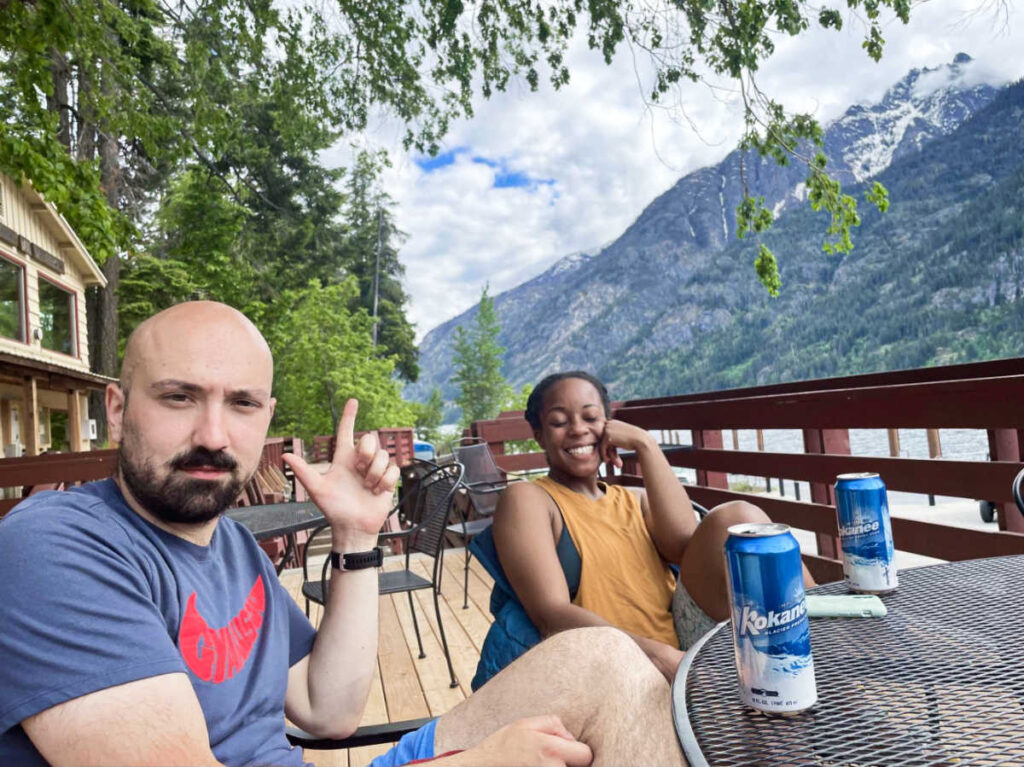 The author Chelsea Booker and her husband relaxing with cans of beer
