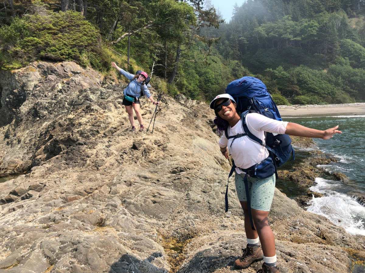 The author, Chelsea Booker and her sister in law backpacking along the coast