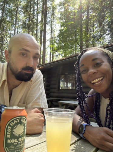 The author Chelsea and Her Husband enjoying their drinks at the park