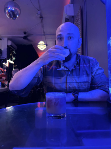 The author's husband drinking at Moloko