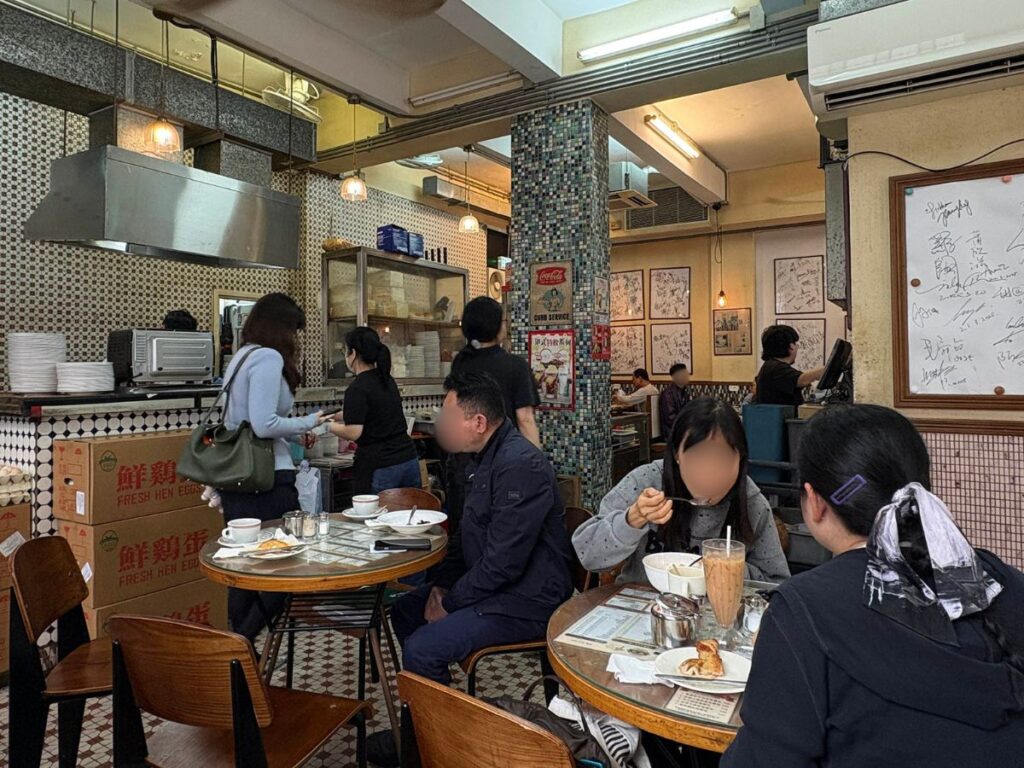 People enjoying the food and drinks at Cheung Hing Coffee Shop