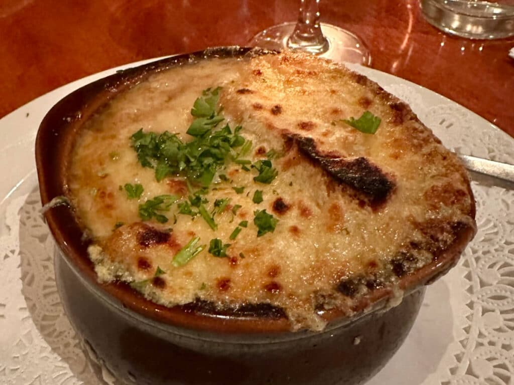 French onion soup on a bowl in Chez Maman
