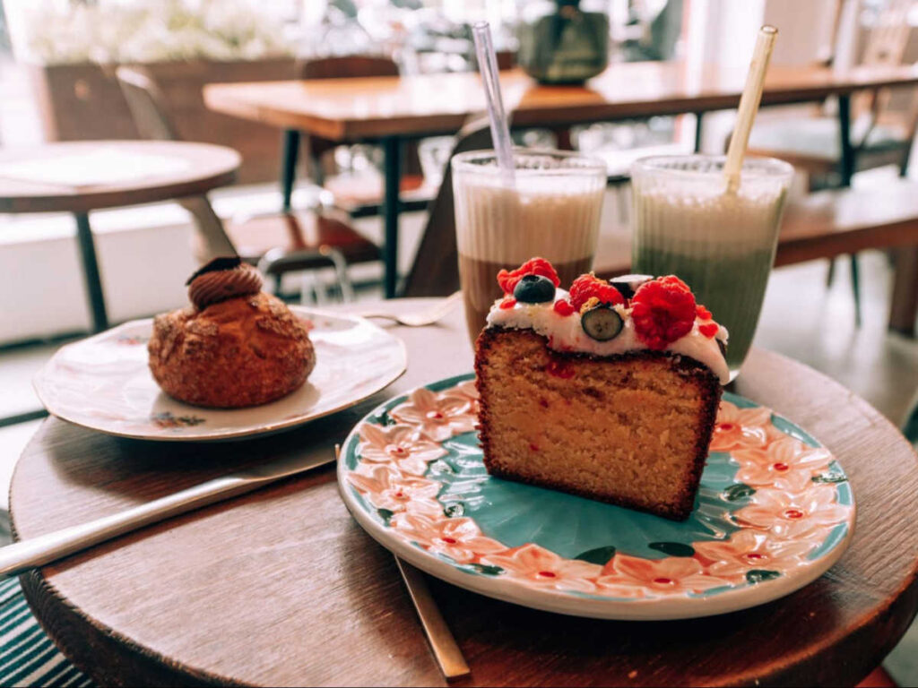 Closeup view of the cakes and drinks on the table