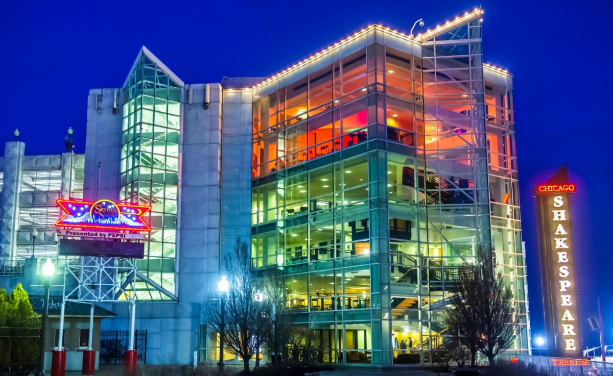 Exterior view of the illuminated Chicago Shakespeare Theater at night