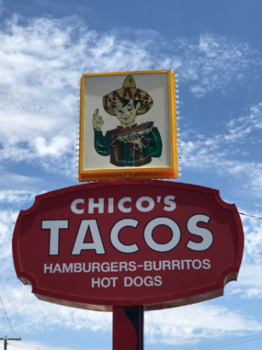 View of the Chico's Tacos sign