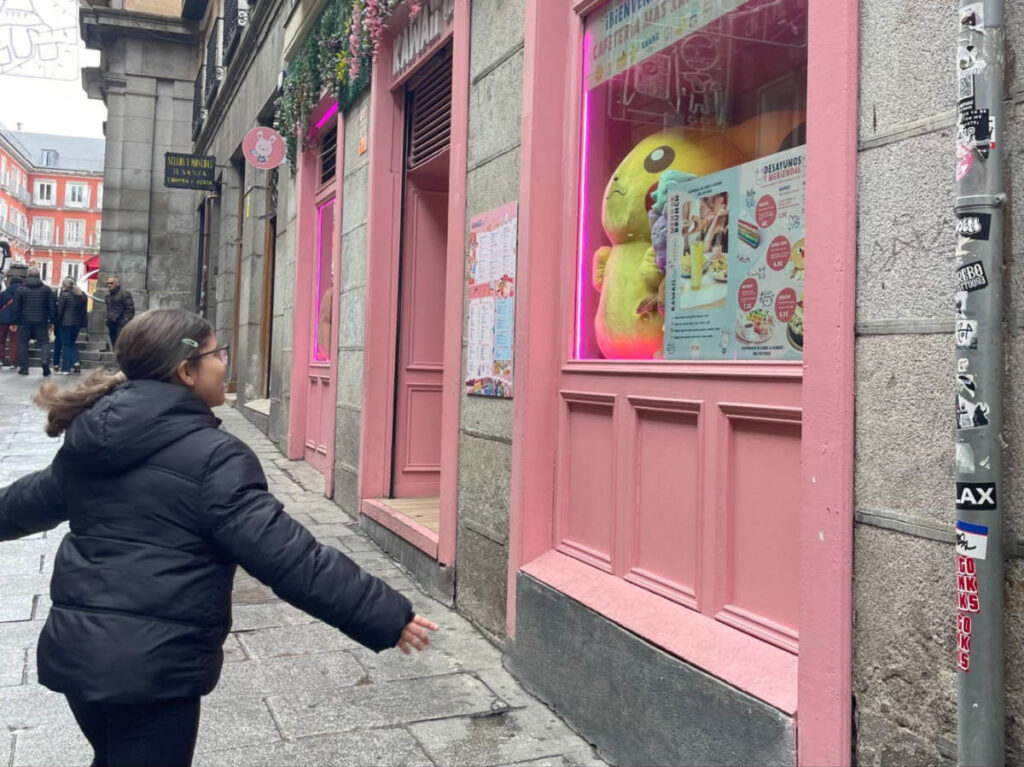 The author's daughter, exploring the colorful shops near Plaza Mayor